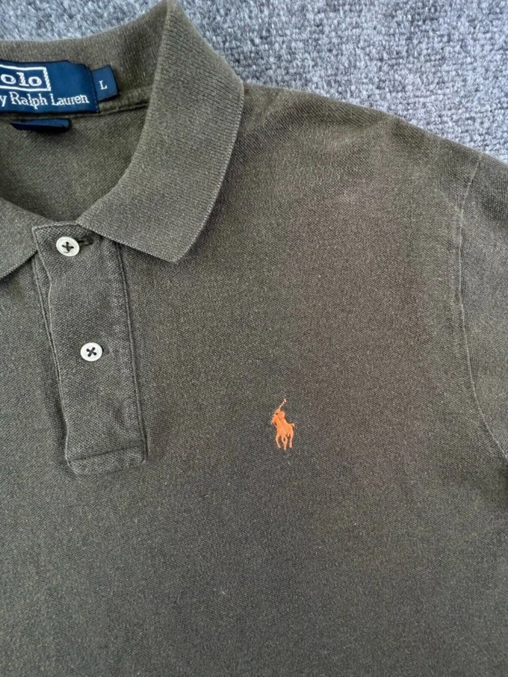 Polo Ralph Lauren mean partially